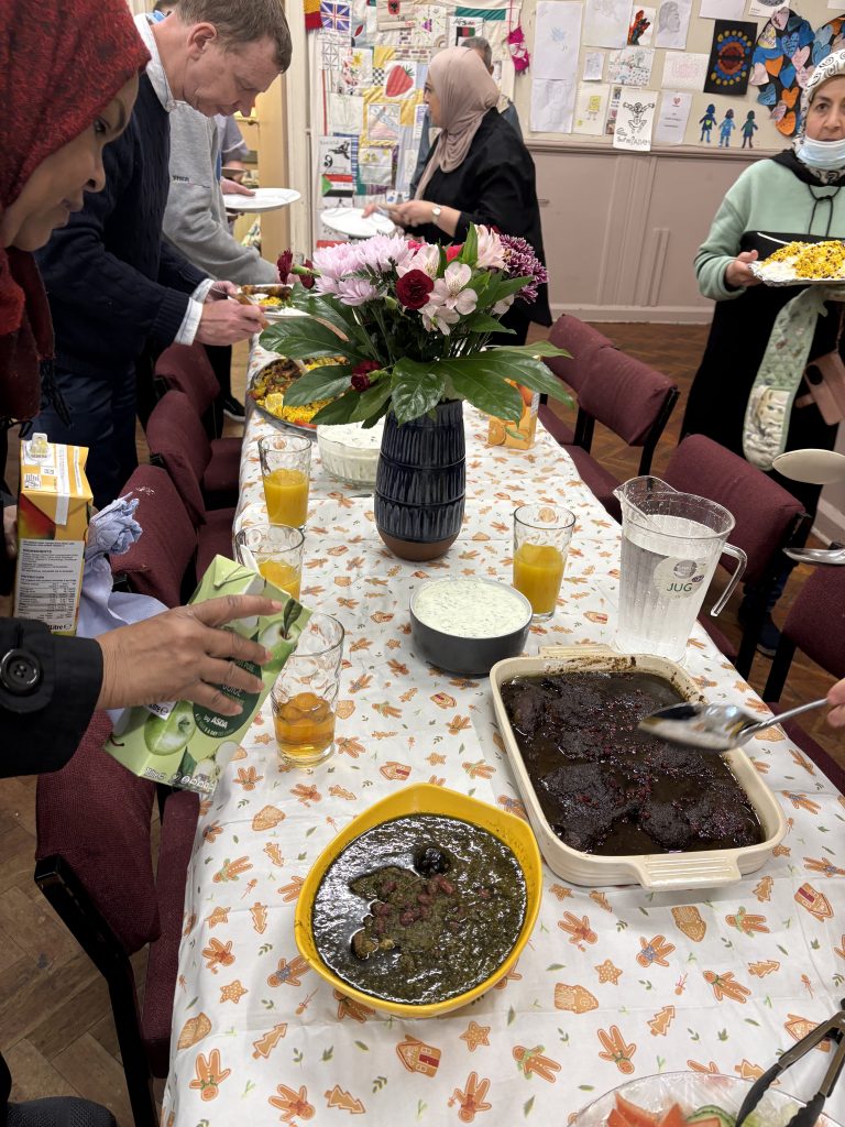 Table with food cooked by the team and volunteers at Heart4Refugees